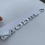 Tesla Black Emblem